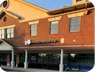The Direct Pediatrics office in Middletown, a brick storefront with the practice sign over the entrance.